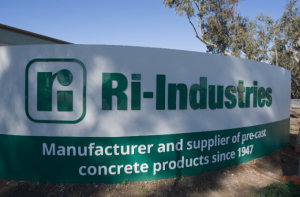 Image shows the sign outside the business. It reads Ri-Industries Manufacturer and supplier of pre-cast concrete products since 1947